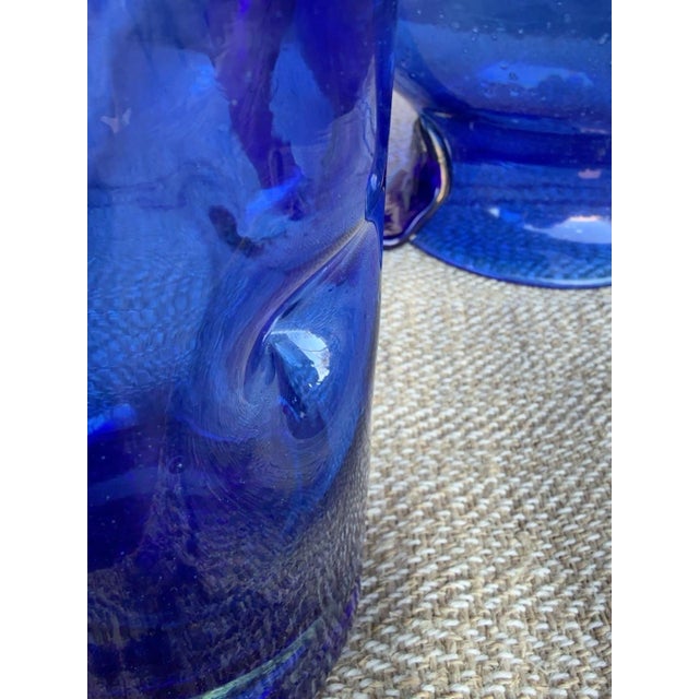Vintage Spanish Revival Hand-Blown Seeded Cobalt Blue Pinched Dimple Glass Pitcher & Tumbler Set - 8 Pieces For Sale - Image 4 of 8