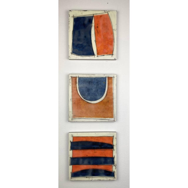 Three 8”x8” cradled wood panels. Each shape is hand cut from natural fiber papers and then suspended between layers of...