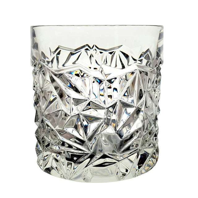 A substantial Tiffany & Co. Rock Cut crystal champagne or ice bucket, distinguished by its exceptionally heavy...