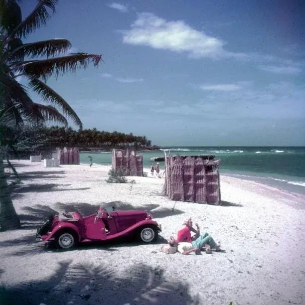 John Rawlings 1950, Fashion photographer John Rawlings (1912 – 1970) on the beach at Montego Bay, Jamaica. (Photo by Slim...