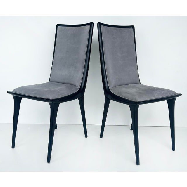 Annibale Colombo Lacquered Suede Dining Chairs, Set of 6 Offered for sale is a set of six black lacquered wood and...