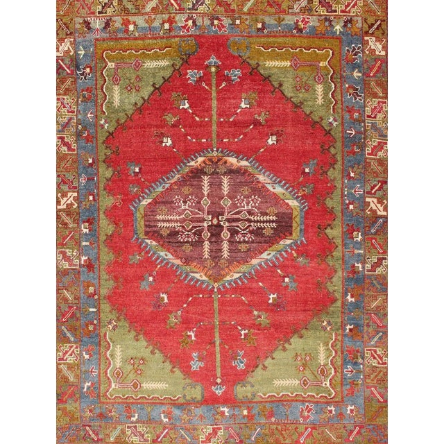 Green, blue and red tribal medallion design antique Oushak rug from 1930's Turkey, Keivan Woven Arts / rug EMA-7531,...
