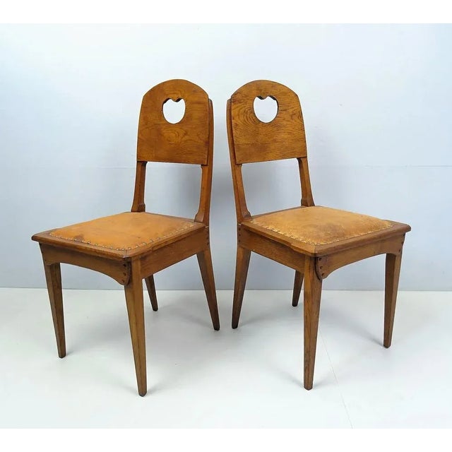 Design around 1903, execution from Vereinigte Werkstätten für Handwerkskunst Dresden Hellerau, solid oak, backrest made of...