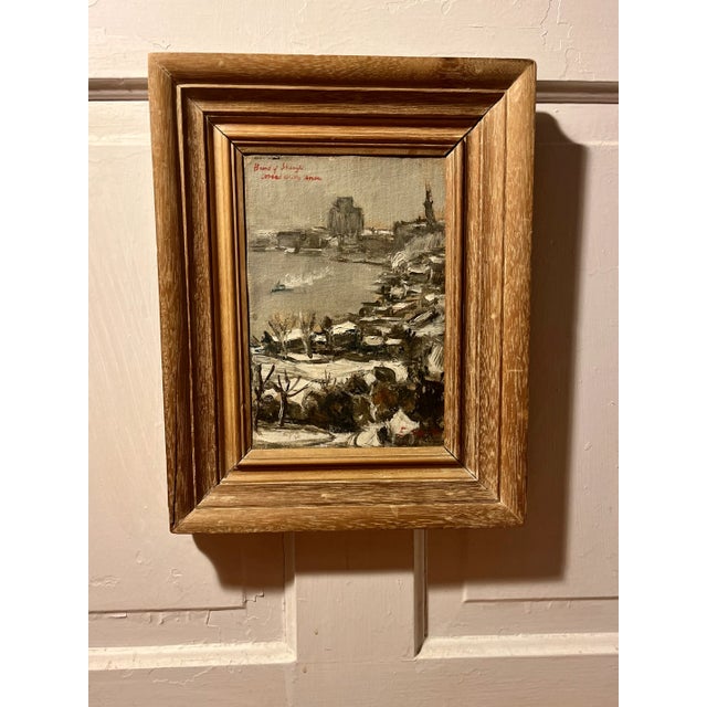 1930's winter snow scene oil painting on canvas titled "Bund of Shanghai Covered with Snow" and signed indistinctly lower...