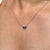 This heart pendant necklace features 0.61 carats of natural blue sapphires set in 14K white gold. Each sapphire measuring...