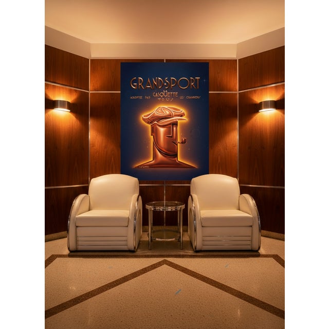 Rare Pair — Art Deco Streamline Moderne Club Armchairs by JAZ — After Donald Deskey Royalchrome An exceptional pair of...