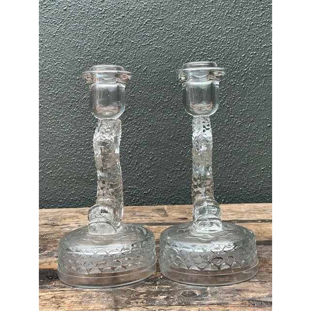Capture the whimsical elegance of coastal-inspired design with this exquisite pair of vintage clear pressed glass...
