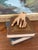 This antique carved wooden hand fragment dates to the 19th century and was likely part of a larger religious figure or...