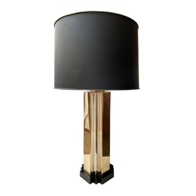 This circa 1970 Art Deco inspired lamp brings all the look! Featuring a stepped form of alternating brass and chrome...