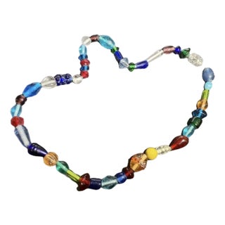Bohemian Glass From Jablonec Nad Nisou (Formerly Gablonz) Pressed Glass Bead Necklace in Various Colors and Shapes For Sale