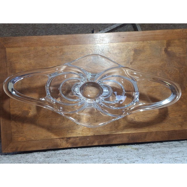 An exceptional hand-blown and hand-worked crystal centerpiece, a masterpiece of french glassmaking from the 1950s. Its...