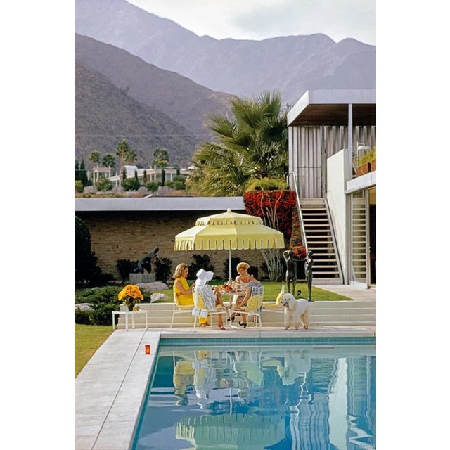Poolside Friendship 1970 by Slim Aarons Slim Aarons Limited Estate Edition Nelda Linsk (left, in yellow), wife of art...