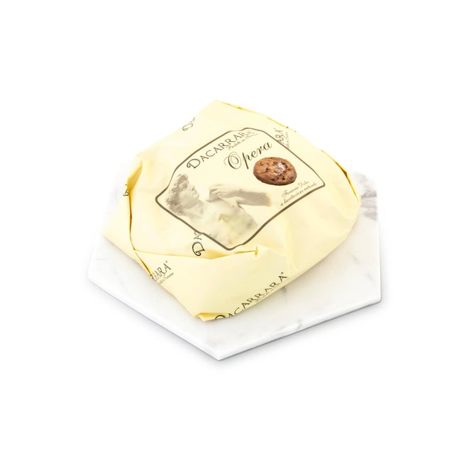 This hexagonal white Carrara marble plate or cutting board comes with cork to the base. Each piece is unique, as every...