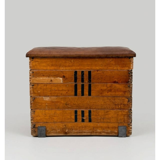 Original mid-20th century gym vaulting box with a strong utilitarian presence, combining solid wood construction with a...