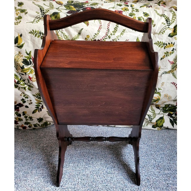 This beautiful antique sewing stand has been fully restored and finished in satin lacquer.It has two doors that rotate...
