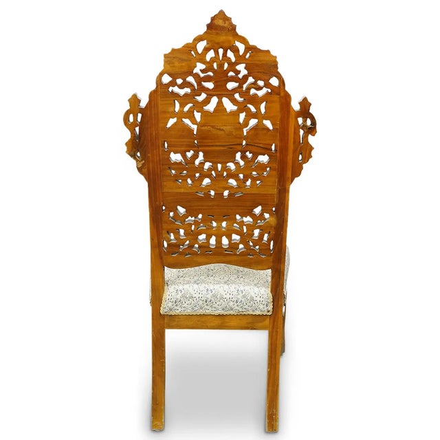 This product is a pair of antique Moroccan-style hall chairs made of wood with bone and mother of pearl accents. The...