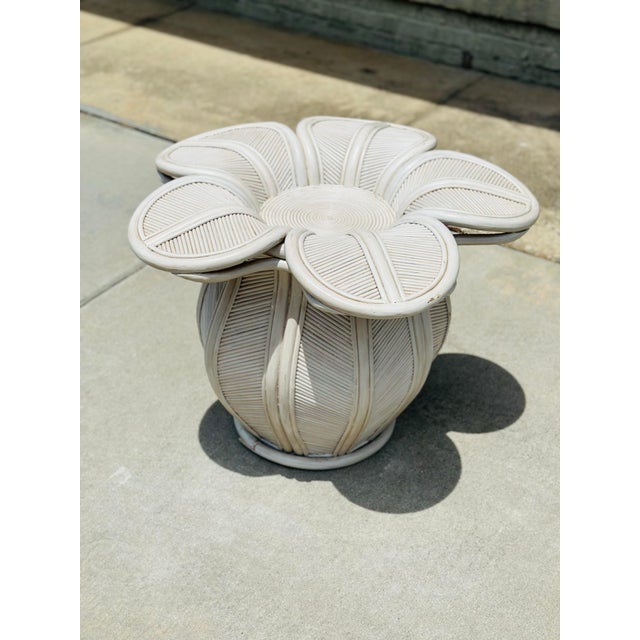 A charming vintage pencil Reed rattan flower table, beautifully crafted in the form of a blooming six-petal flower....