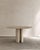 Roman dining table ii in roman travertine by paloma editions dimensions: d 130 x w 130 x h 75 cm. Materials: travertine....