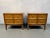 Striking mid-century modern bedroom set featuring a maple headboard and matching pair of nightstands with decorative...
