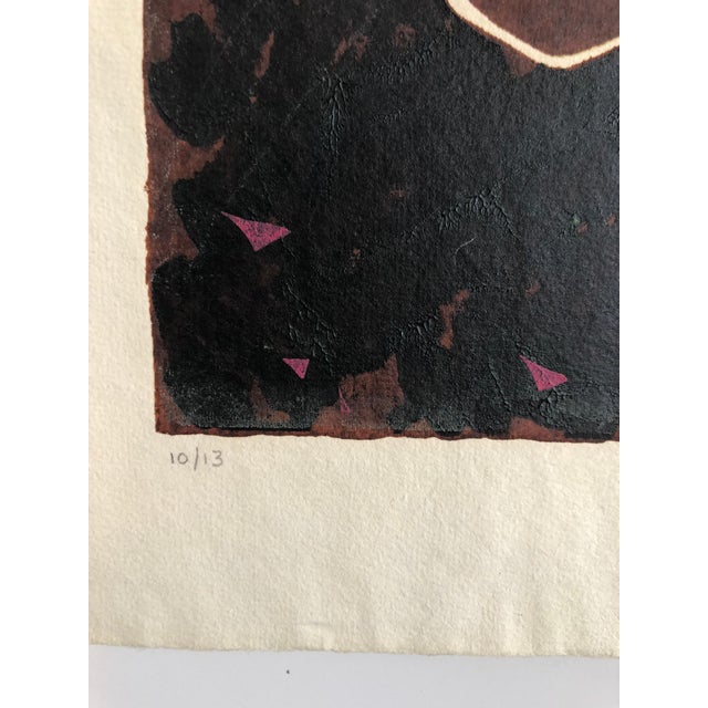 This came out of a Chicago collection. It appears to be signed Linda Tweed. It depicts a dragon or griffin (phoenix?) like...