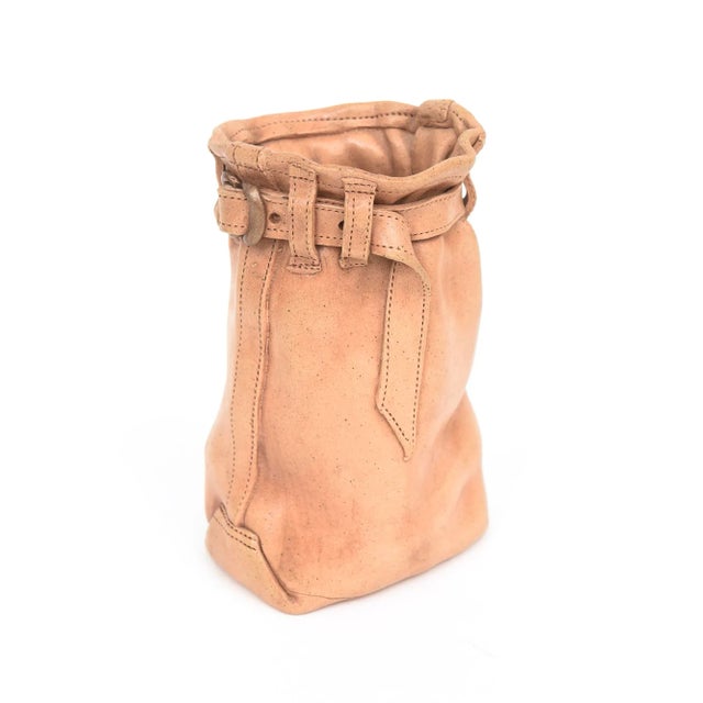 This amazing signed 1990's tan ceramic buckle sculpture resembles real leather. Once needs to take a double take, feel and...