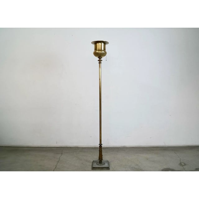 Vintage Hollywood Regency torch floor lamp for sale. Manufactured in the late 1960's / 1970's by high-end lighting design...