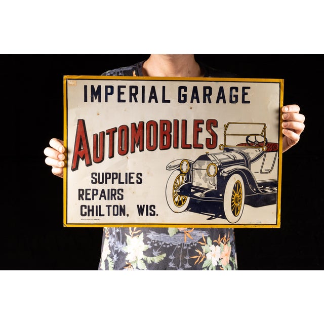 This vintage Imperial Garage embossed tin sign originated in the 1920s. This sign reads 'Imperial Garage Automobiles....
