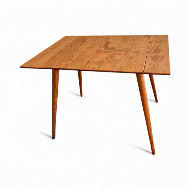 This exceptional 1950s Paul McCobb Planner Group dining table embodies the clean lines and refined simplicity that define...