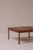 A beautifully made square coffee table from the 1960s–1970s, constructed entirely in solid wood and defined by its unusual...