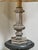 Probably from the lucien gau workshop, paris. The lamp is made of solid metal, with a distinctly architecturally...