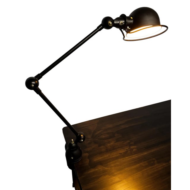 This adjustable industrial style task lamp was designed by Jean-Louis Domecq and manufactured by French brand Jieldé in...