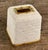 This tissue box cover by Nicole Miller NYC features a woven herringbone pattern rendered in cream colored resin. The...
