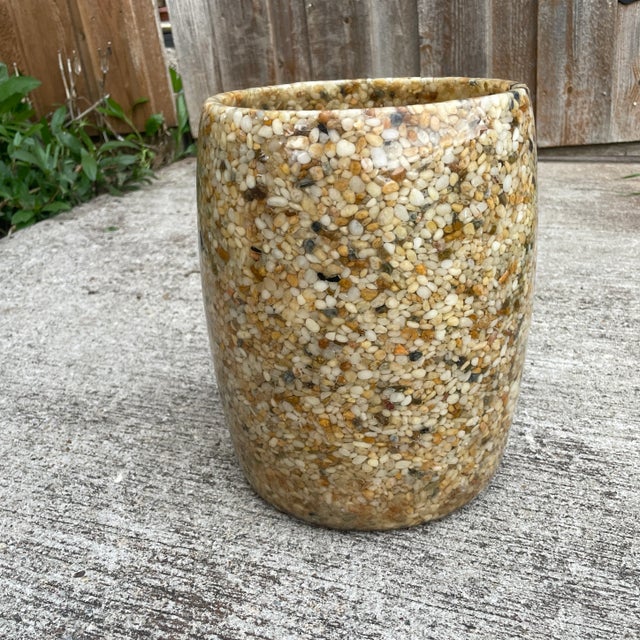 Bring a sculptural and earthy elegance to your entryway or bathroom as a wastebasket with this striking Mid-Century Modern...