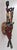 Antique Hand-Carved Guro Mask of the Ivory Coast Featuring a Seated Figure Measures 7 1/4" wide, 6 1/4" deep and 30" tall....