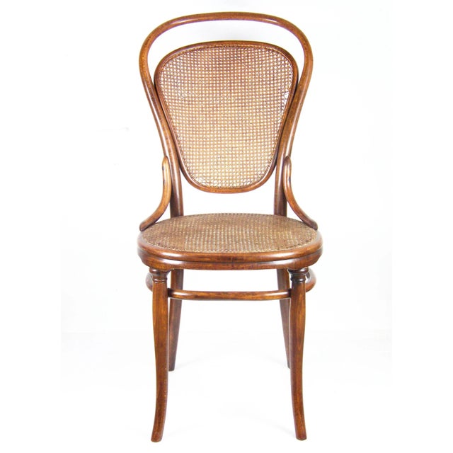 Original state with a pleasant patina of age, perfectly cleaned and re-polished with shellac finish. New seat string. This...