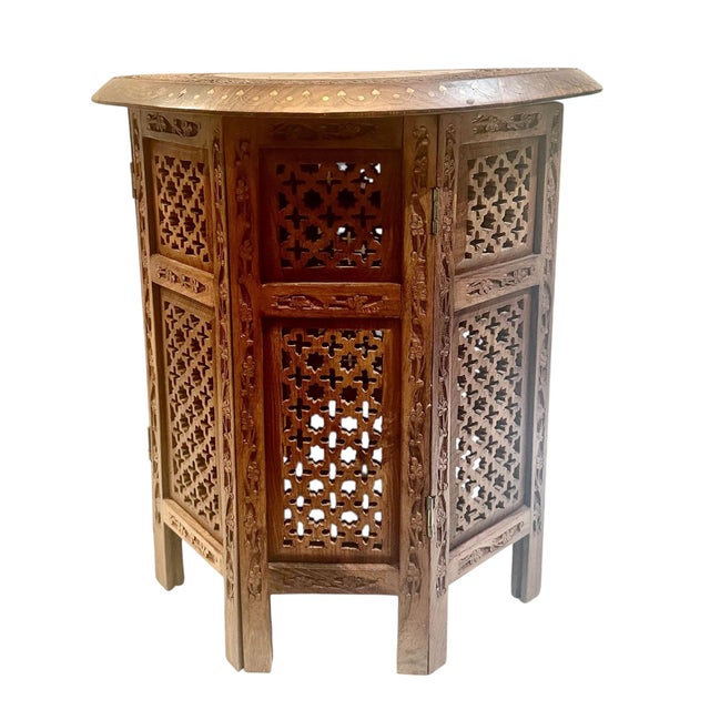 A richly detailed ottoman style side table, dating to the turn of the century, circa 1900–1915 . This extraordinary piece...