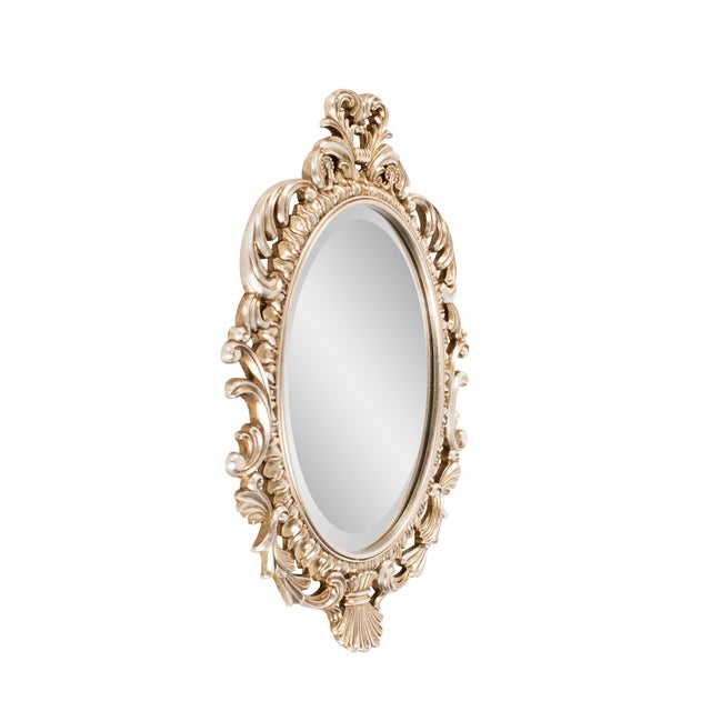 Finished in a luxurious antique silver, the ornate frame adds a touch of classic sophistication, making it a perfect...