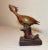 This antique hand carved wooden bird statue from the late 19th century is a unique piece of Folk Art featuring intricate...