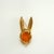 Vintage brooch in the shape of a rabbit with extra large ears. Metal is gold plated with textured finish. The face is...