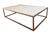 Custom-made white marble coffee table with brass base. The base is untreated, so it has a lovely patina, but it can be...