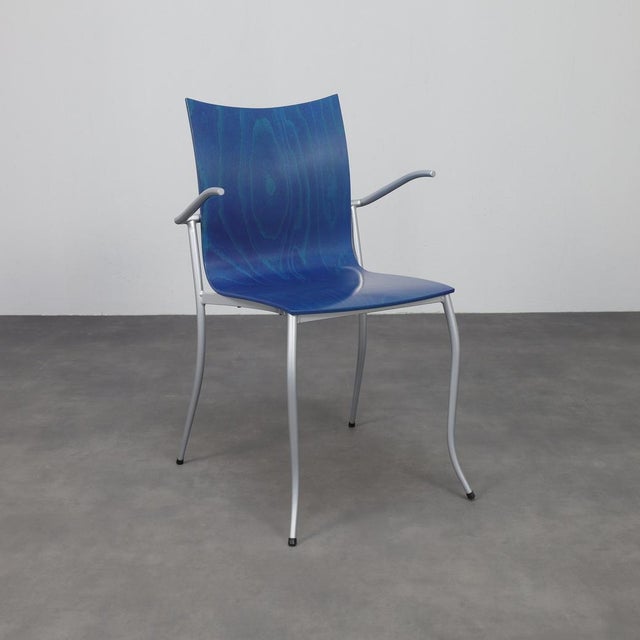 A set of four postmodern dining chairs designed by karl friedrich förster for kff in the 1990s. The seats and backs are...