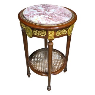 French Louis XVI Marble Top Side Table With Hand-Carved Wood Frame, Gold Leaf Accents & Cane Shelf For Sale