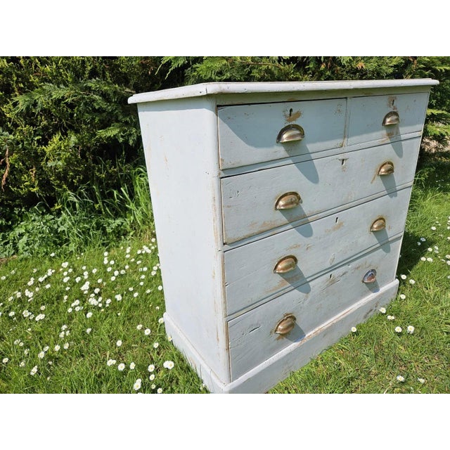 Victorian Pine painted chest of drawers with brass cup handles A wonderful, timeless classic piece which will sit well in...