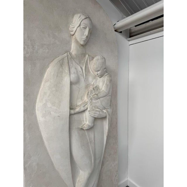 A huge plaster relief depicting motherhood (titled Materniita) attributed to Domenico De Lisi. 1920, Italy. Literature:...