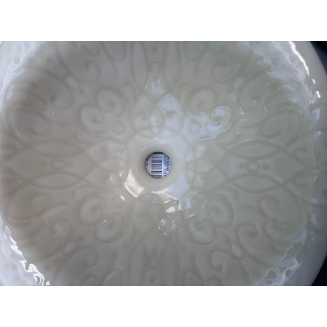 Bring bespoke artistry and rich, sculptural texture to your next bathroom design with this magnificent pair of Kohler...
