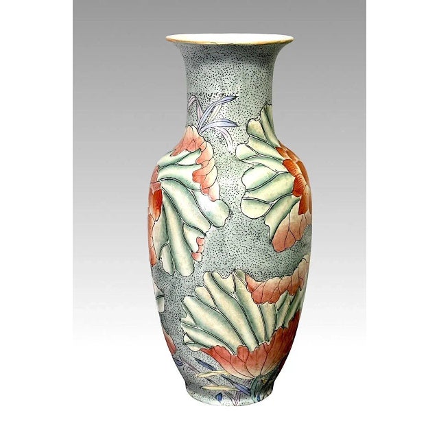 Beautiful Kangxi inspired design baluster form vase, hand painted in colourful enamels portraying a dense lotus flower and...