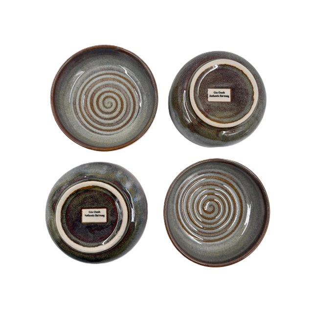 This elegant bowl set for four showcases the refined artistry of Bat Trang, Vietnam, renowned for its centuries-old...
