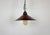 Industrial dark red enamel factory pendant light made in Poland during the 1960s. White enamel inside the shade. The...