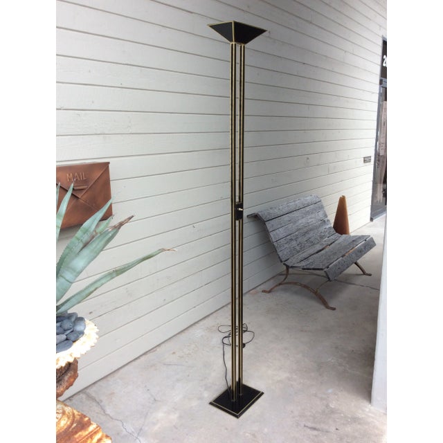 Found in the South of France, this Mid Century Modern French Halogen Floor Lamp is constructed of metal in black with...