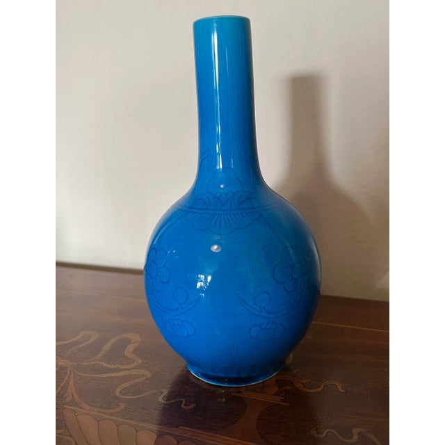 Chinese ceramic vase in robin’s egg blue monochrome and floral underglaze decoration. Unmarked